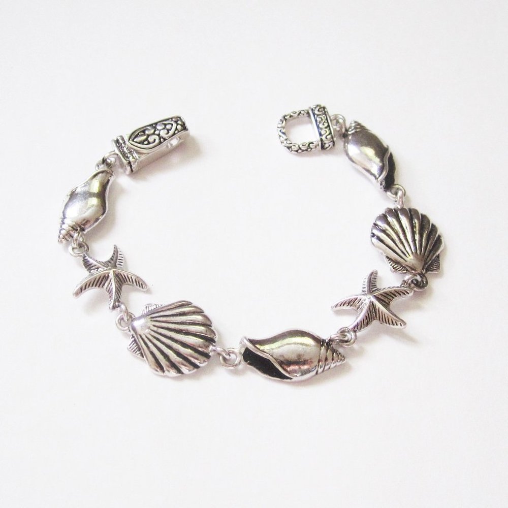 Silver tone magnetic  sea life bracelet